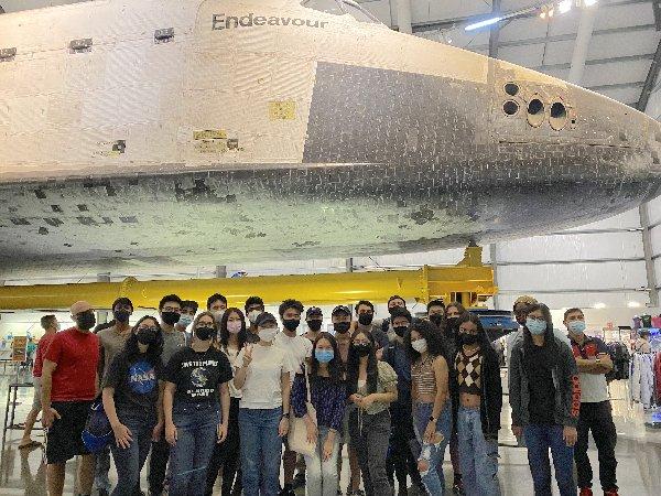 Tech & Innovation residents visiting the Space Shuttle Endeavor exhibit in Exposition Park