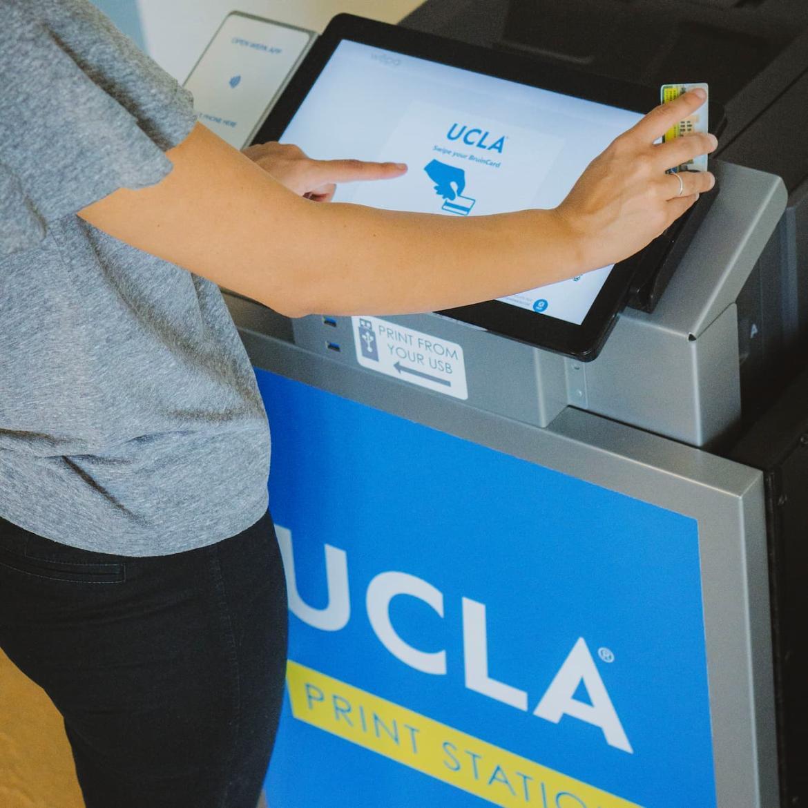 shows student using Bruincard to swipe to wepa