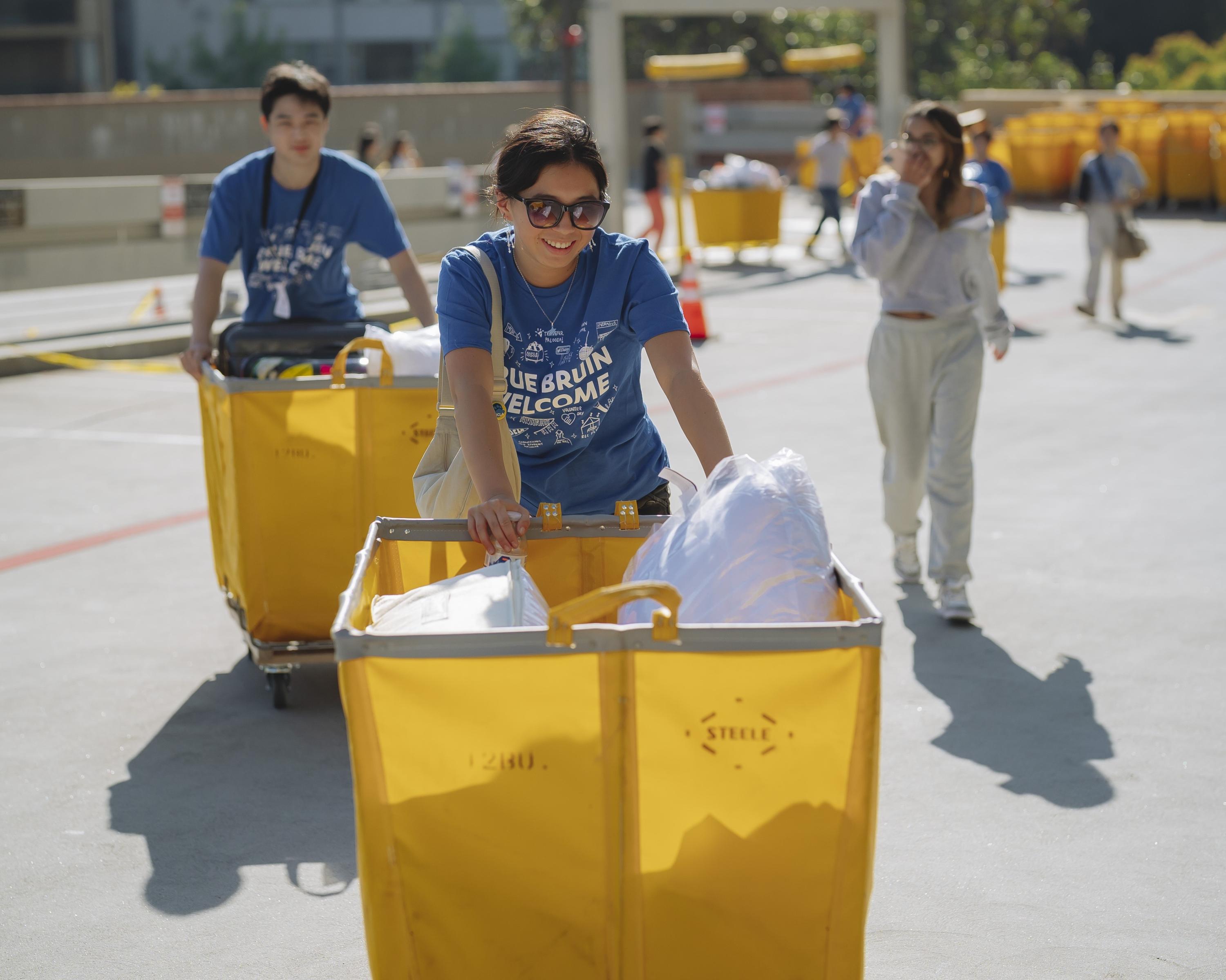 Student Pushing a cart at UCLA Move In