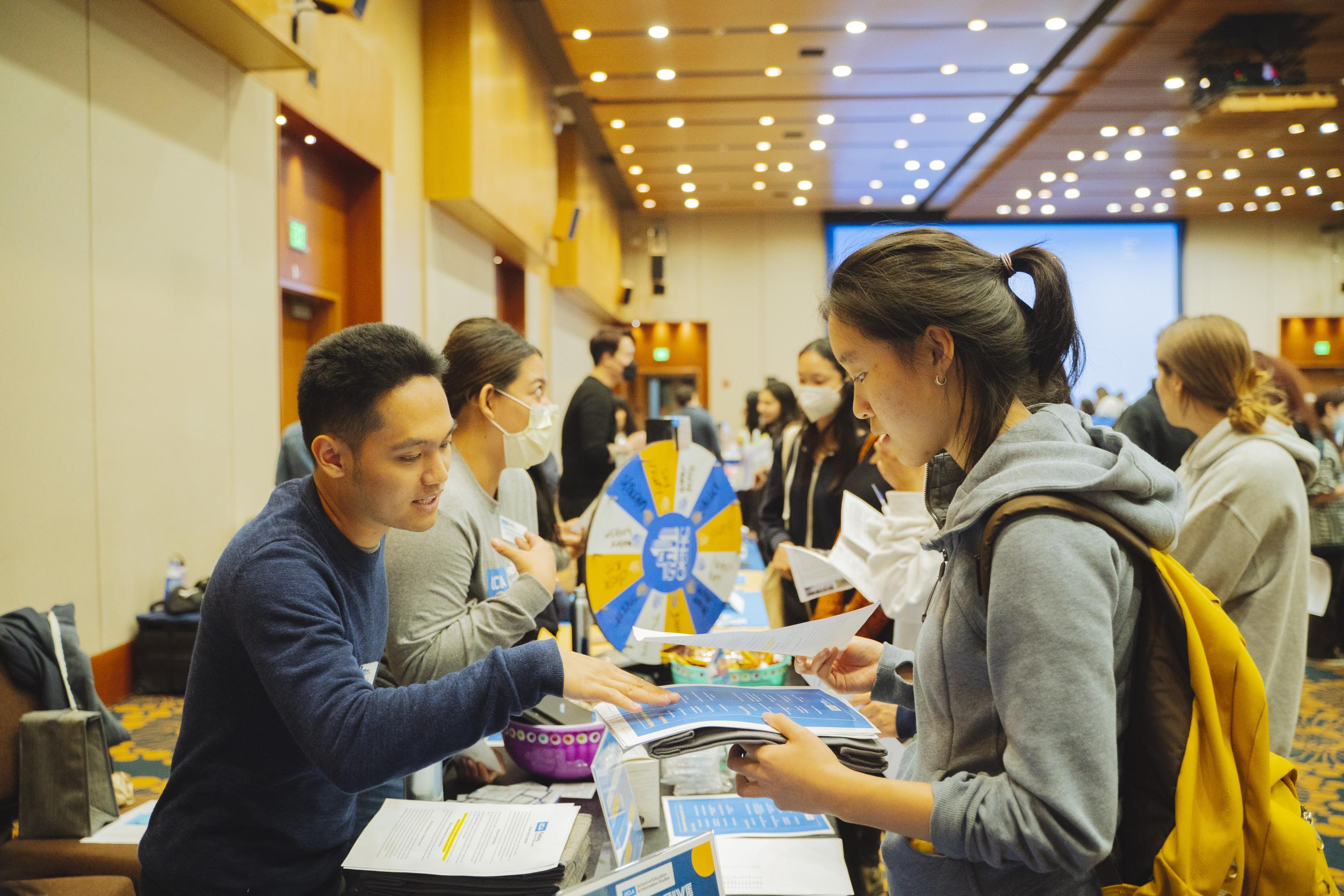 Academic advisor and student talking